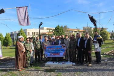 غبارروبی مزار شهید خوشنام در هفته بسیج توسط پایگاه بسیج نصر کمیته امداد استان گلستان